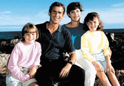 George Walker Bush met zijn Laura, Jenna en Barbara